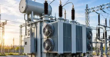 industrial substation transformer at sunset